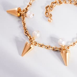 gold and pearl charm bracelet