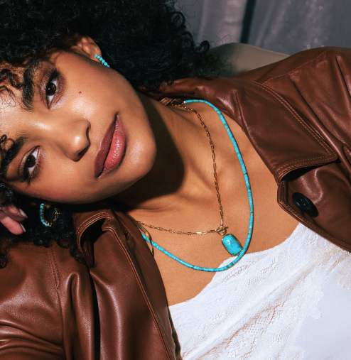 woman wearing turquoise jewelry
