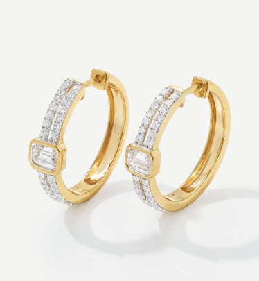 yellow gold hoops with white gemstones 