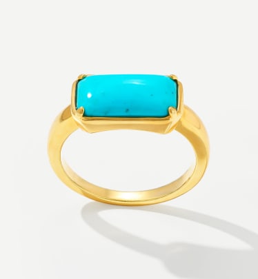 turquoise solitaire ring in yellow gold 