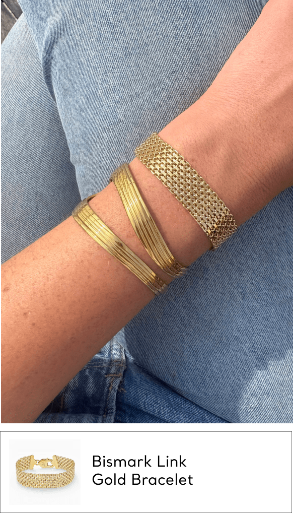 woman wearing gold link bracelet