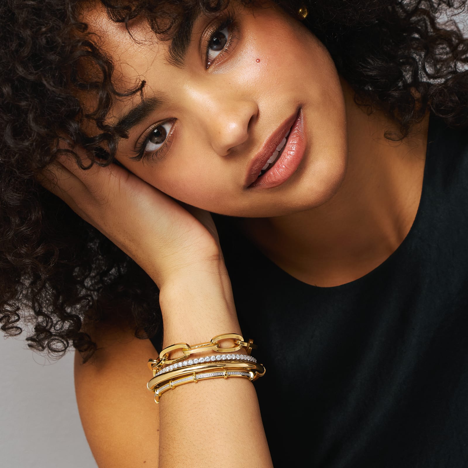 woman wearing bangle bracelets 