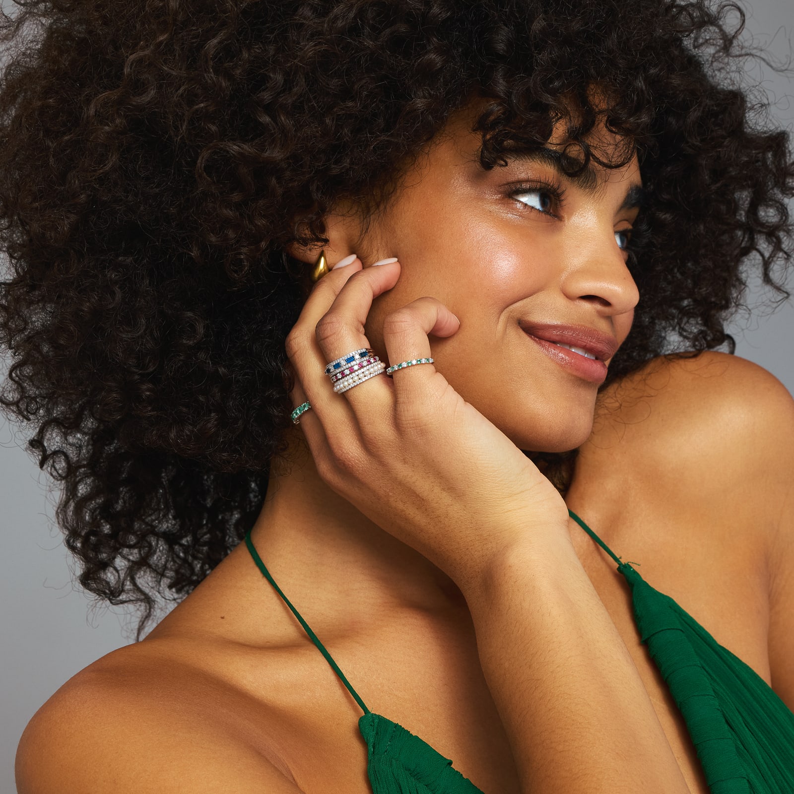 woman wearing multiple rings 