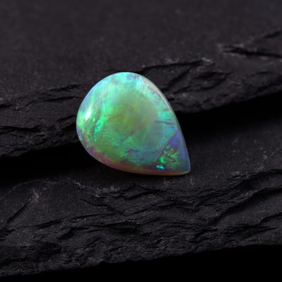 A loose pear-shaped opal gemstone