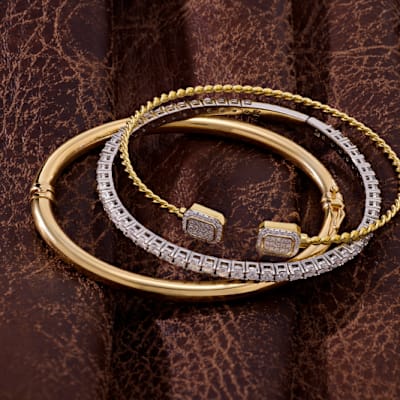 Stackable bracelets in mixed metals 