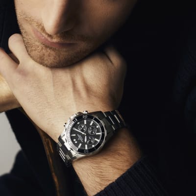 Jacques Lemans watch with black dial and stainless steel band 