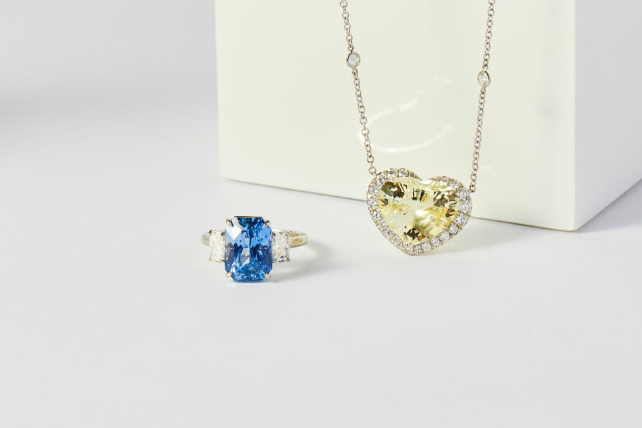 In platinum, a blue sapphire ring and a yellow sapphire pendant 