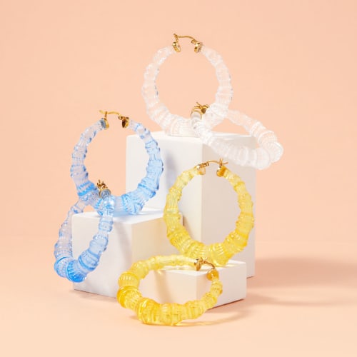 Blue, clear, and yellow hoop earrings from Gold & Honey