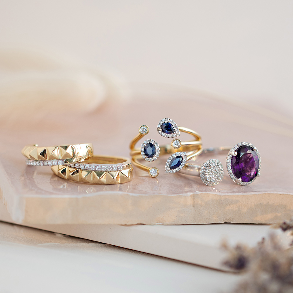Earrings, sapphire ring, and amethyst ring 