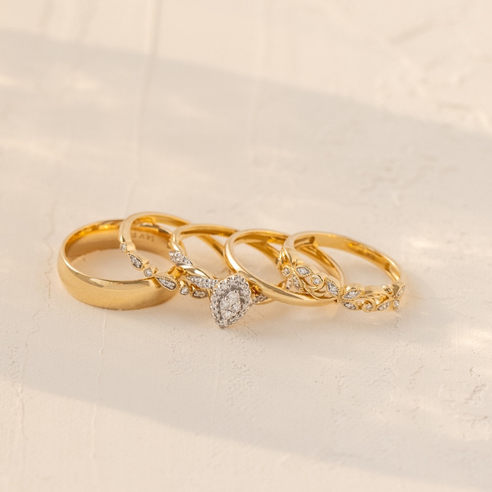 Thin gold bands ring stack 