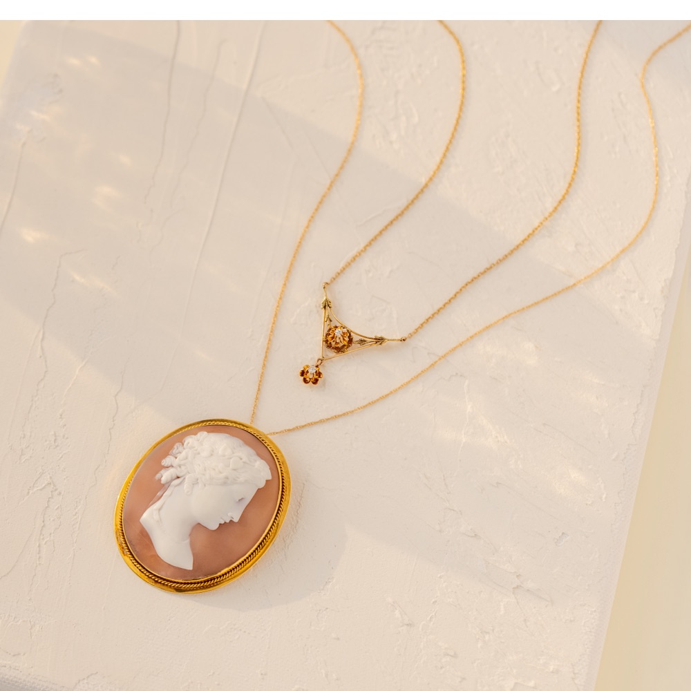 Cameo pendant statement necklace and floral gemstone necklace 