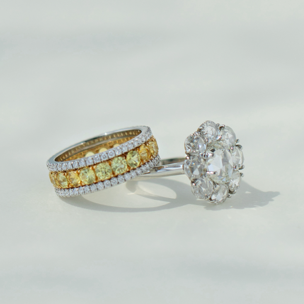 yellow gemstone band ring and white gemstone ring 