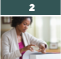 Woman attaching a label to a package 