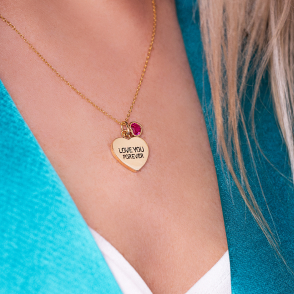 woman wearing heart pendant