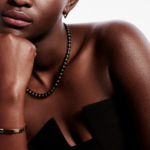 woman wearing a tennis necklace